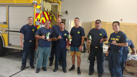 Puna district firefighters appreciating the generosity of Greenwell Farms’ customers, whose coffee donations will help get them through some long days and nights protecting the Puna community.
